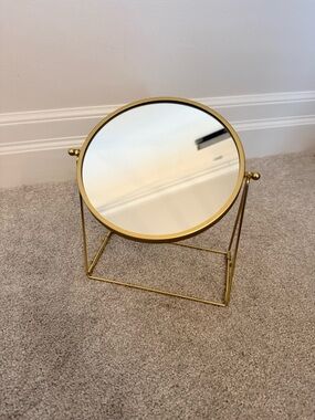Gold Round Tilt Mirror on Minimalist Stand